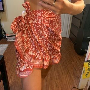 Red flower print side tie skirt